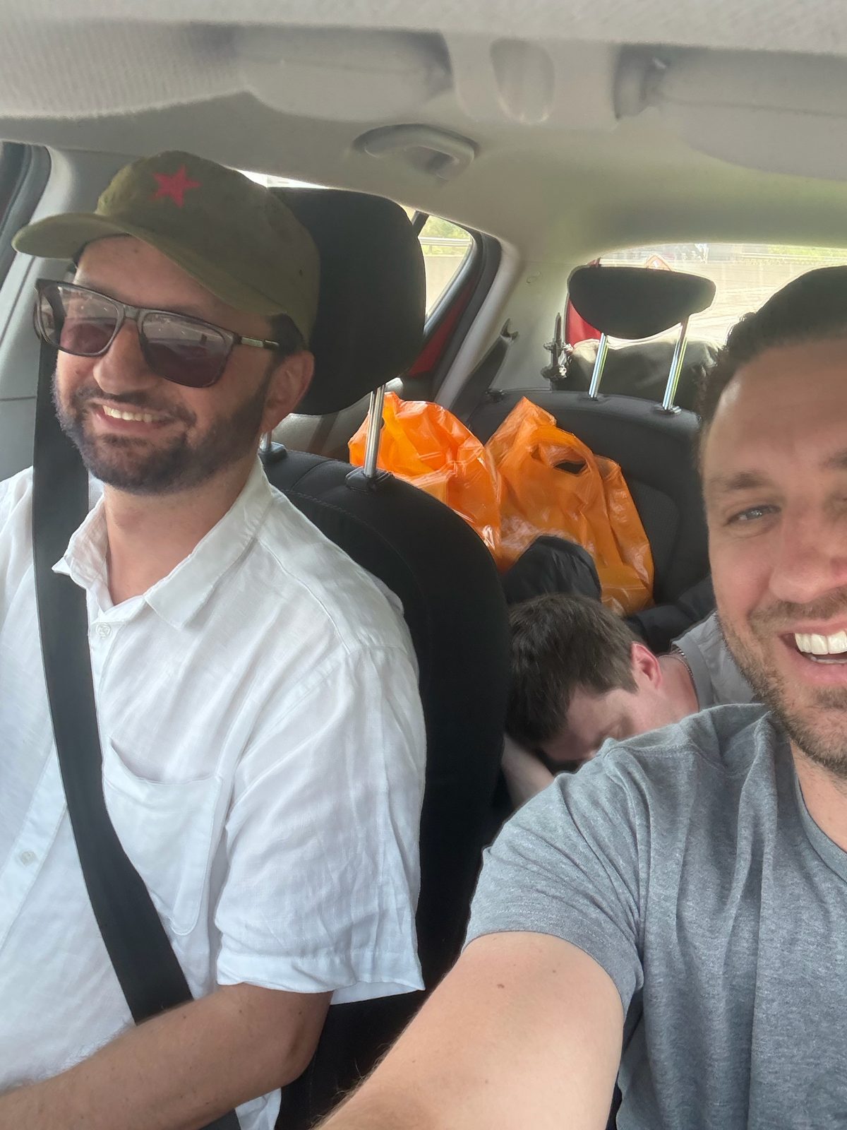 Day one in the car: one driving, one asleep, one taking the selfie